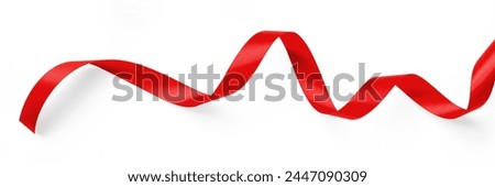 Red satin bow ribbon scroll isolated on white background with clipping path for Christmas holiday and wedding anniversary card confetti design decoration 