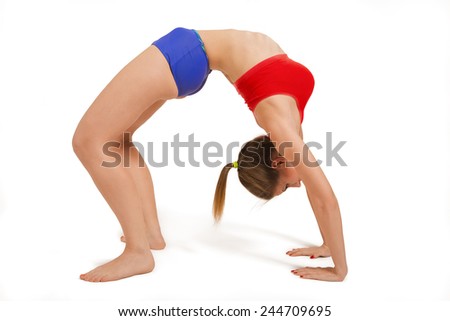 Young woman doing Yoga exercises on white background. Bridge pose - Urdhva Dhanurasana