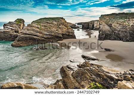 Cliff formations on Cathedral Beach in Galicia Spain. Playa de las Catedrales, As Catedrais in Ribadeo, province of Lugo. Cantabric coastline in northern Spain. Tourist attraction. Royalty-Free Stock Photo #2447102749