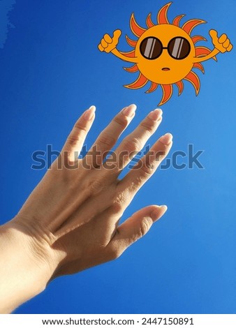 Solar Eclipse. Summer Collage with Kawaii sun and human hand against Blue Sky background with copy space. Trendy Photo and illustration Collage can used social media reels backdrop. Vertical photo.