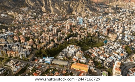 La Paz, Bolivia, aerial view flying over the dense, urban cityscape. San Miguel, southern distric. South America Royalty-Free Stock Photo #2447166729