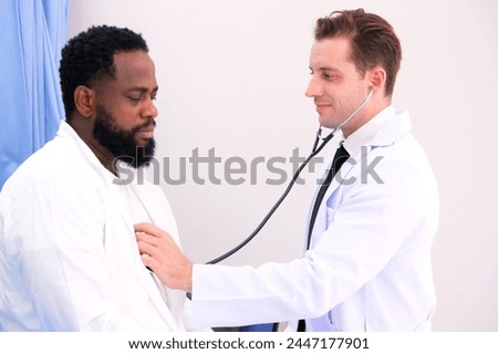 Doctors use a medical stethoscope to check the patient's heart rhythm. medical concept.
