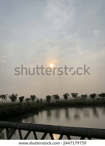 the beauty of the sunset across the rice fields
