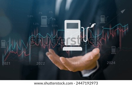 Concept of energy management with businessman presenting a oil price display of fuel pump intertwined with upward trending graphs, Oil energy graph world market, market trends, economic growth