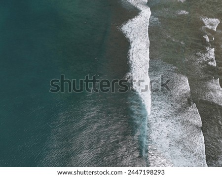 Drone view of ocean waves off the coast of hawaii