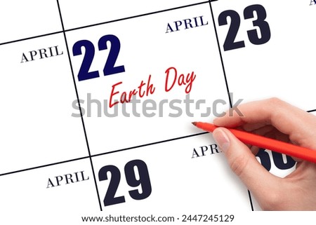 April 22. Hand writing text Earth Day on calendar date. Save the date. Holiday. Important date. Royalty-Free Stock Photo #2447245129