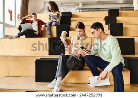 A multicultural couple sitting on steps, engaged in conversation and sharing a moment of connection and friendship Royalty-Free Stock Photo #2447252991