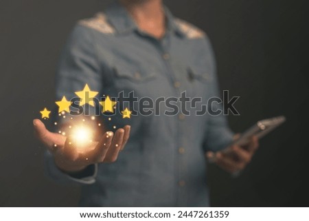 5 stars on hand. Satisfaction rating concept. Service review and quality evaluation. excellent, impressive, very likable Royalty-Free Stock Photo #2447261359