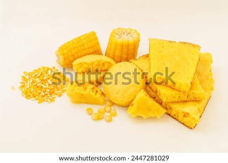 Corn tortillas and ingredients on white background