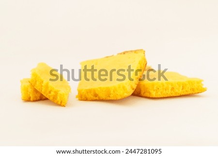 Corn tortillas and ingredients on white background
