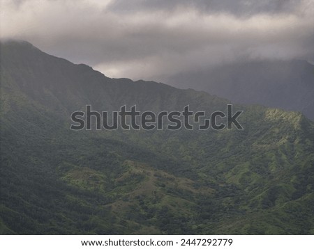 Sunrise over cloudy hawaii mountains