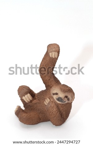 miniature figurine toy of a sloth