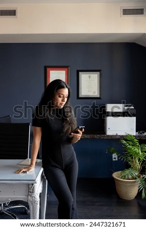 Healthcare professional with smartphone folder