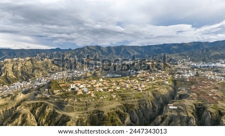 La Paz, Bolivia, aerial view flying over the dense, urban cityscape. San Miguel, southern distric. South America Royalty-Free Stock Photo #2447343013