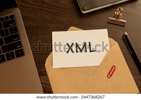 There is word card with the word XML. It is as an eye-catching image.