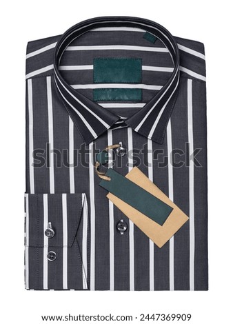 Classic black and white striped folded long sleeve shirt isolated on white background, top view
