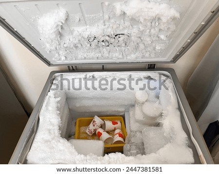 Frost build up in a freezer  Royalty-Free Stock Photo #2447381581