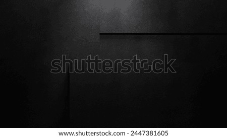 Black abstract forms wall with concrete or chalkboard texture, black textured empty wall and soft spotlight. Hight resolution dark gray background for text or design. Blank black textured surface