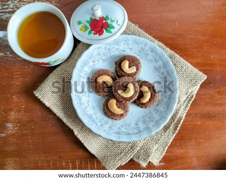Choco Cashew Cookie also known as Kue Coklat Mede Popular cookies. Choco Cashew Cake served for Eid al-Fitr in Indonesia