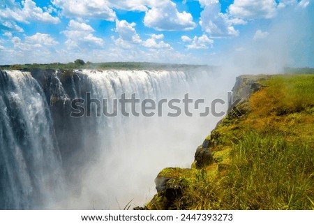 Deep gorge at Rainbow Falls overlook at Victoria Falls. Royalty-Free Stock Photo #2447393273