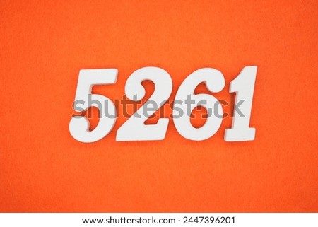 Orange felt is the background. The numbers 5261 are made from white painted wood.