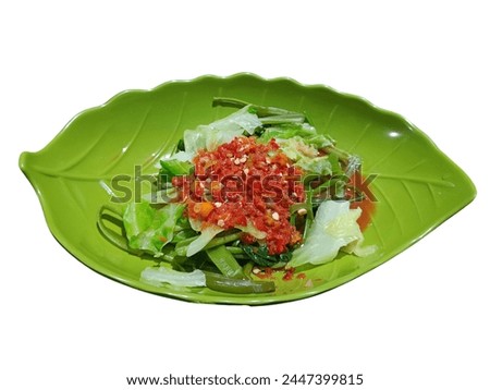 Plecing Kangkung. Indonesian spicy water spinach dish commonly served with a grilled fish. The picture is isolated in white background. Perfect for recipe, article, menu book, or any cooking contents.