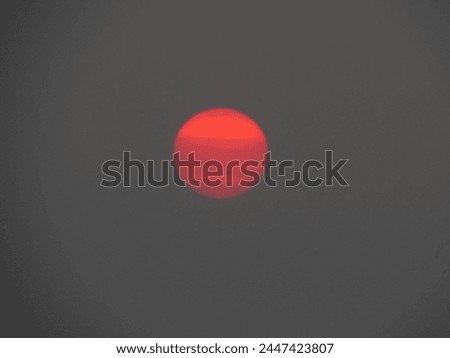 dusky view of the setting sun during sunset in the evening Royalty-Free Stock Photo #2447423807