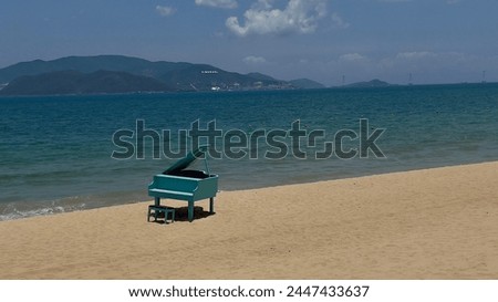 The blue piano on the shore at the Nha Trang beach