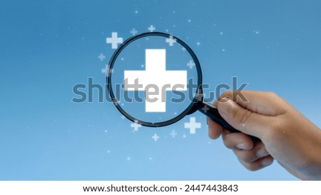 Magnifying glass with plus and medical icons for medical and health care concept, Access to welfare health, People with health care, Health insurance, Family life insurance, Medical care insurance