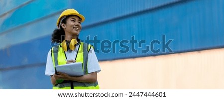 Foreman or worker hand holding checklist for writing and checking in goods in container at Container cargo site. Foreman or worker work at  in Container cargo site. Container cargo worker work in site