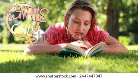 Image of girls only text over woman reading book. female power, feminism and gender equality concept digitally generated image. Royalty-Free Stock Photo #2447447047