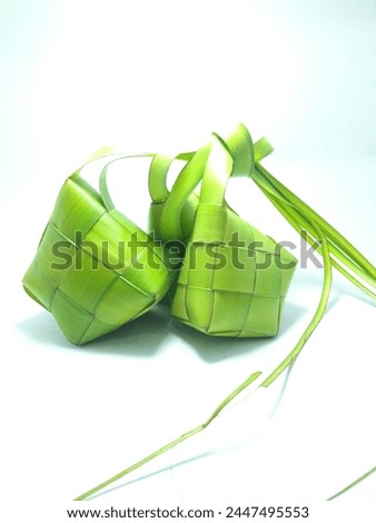 some ketupat shells to celebrate the eid holiday on white background