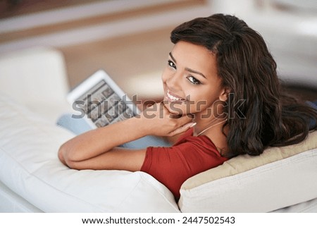 Girl, relax and portrait with tablet on sofa to watch video on holiday or streaming film on vacation. Online, search and happy woman scroll on website with tech in home to download movies or tv show