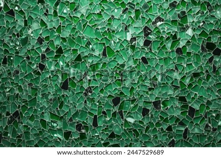 Processed collage of green terrazzo floor surface texture. Background for banner, backdrop or texture for 3D mapping