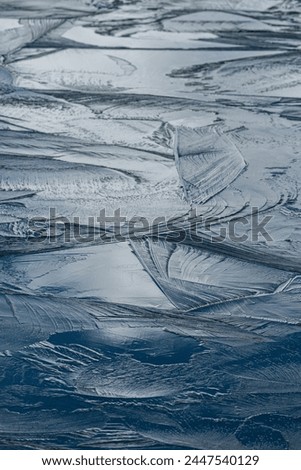 Beautiful pattern on the frozen lake surface