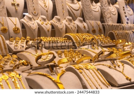 Close-up of a variety of beautiful gold jewelry on the counter in Istanbul, Turkey.