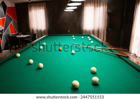 Billiard Balls On Green Pool Table