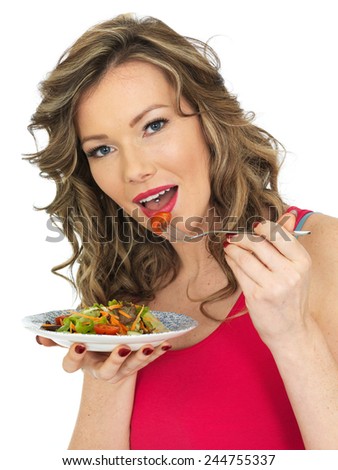 Healthy Young Woman Eating a Fresh Crispy Garden Salad