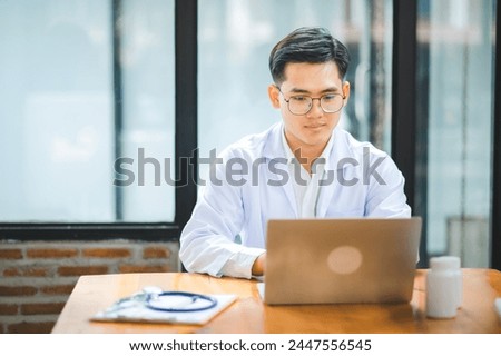 Doctors are giving advice to patients via online video, informing them of physical examination results and suggesting treatment and health care. Royalty-Free Stock Photo #2447556545