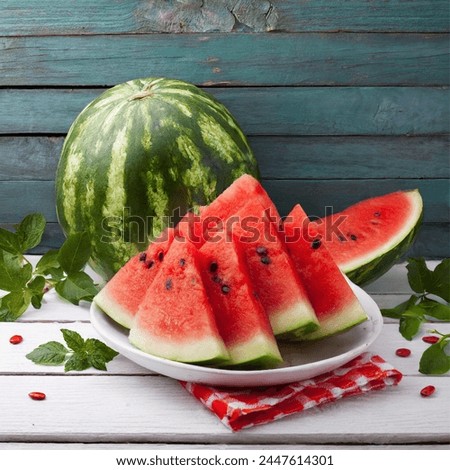 A close-up view of sliced watermelon on a rustic wooden table. The watermelon slices are bright red and juicy,  The image evokes feelings of summer, refreshment, and healthy eating.
