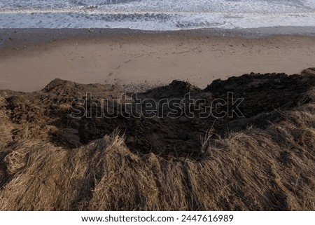 Coastal Erosion, Holderness Coast UK. Coastal Erosion, Holderness Coast UK. Holderness is an area of the East Riding of Yorkshire, on the north-east coast of England.  Royalty-Free Stock Photo #2447616989
