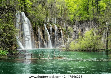 Amazing picture with some of picturesque waterfalls in the green spring forest of Plitvice national park in Croatia. Plitvice lakes close view.
