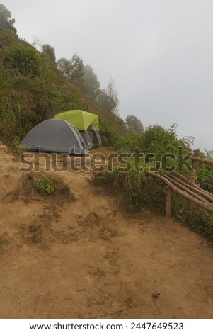 View of the tent in the beautiful mountain top during a foggy morning, from Munnar top station