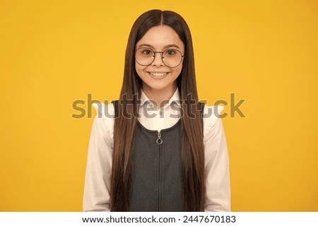 Beautiful teen girl student. Portrait of teenager school girl on isolated background. Clever schoolgirl, nerd smart child. Happy girl face, positive and smiling emotions.