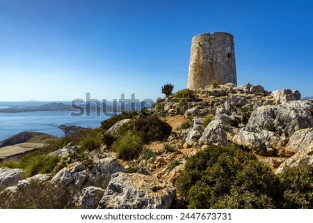The Albercutx watchtower at Cap de Formentor in northwestern Mallorca, Spain Royalty-Free Stock Photo #2447673731