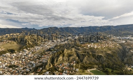 La Paz, Bolivia, aerial view flying over the dense, urban cityscape. San Miguel, southern distric. South America Royalty-Free Stock Photo #2447699739