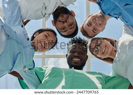 Portrait of a group of happy doctors and nurses in hospital