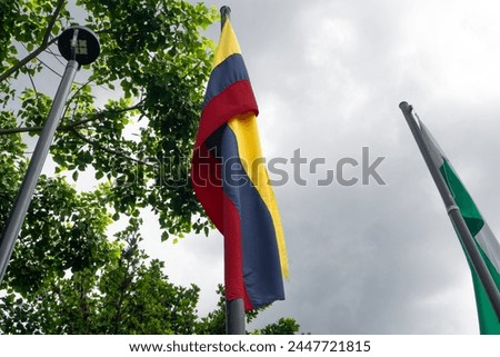 Flag of Antioquia and Colombia waving