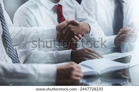 businessman shakes hands, making a deal with a lawyer. male judge legal