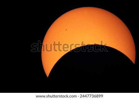 A solar eclipse electrified all of North America on the afternoon of April 8, 2024.  On Manitoulin Island, Ontario, we didn't get a full eclipse but my telescope caught some terrific images. Royalty-Free Stock Photo #2447736899